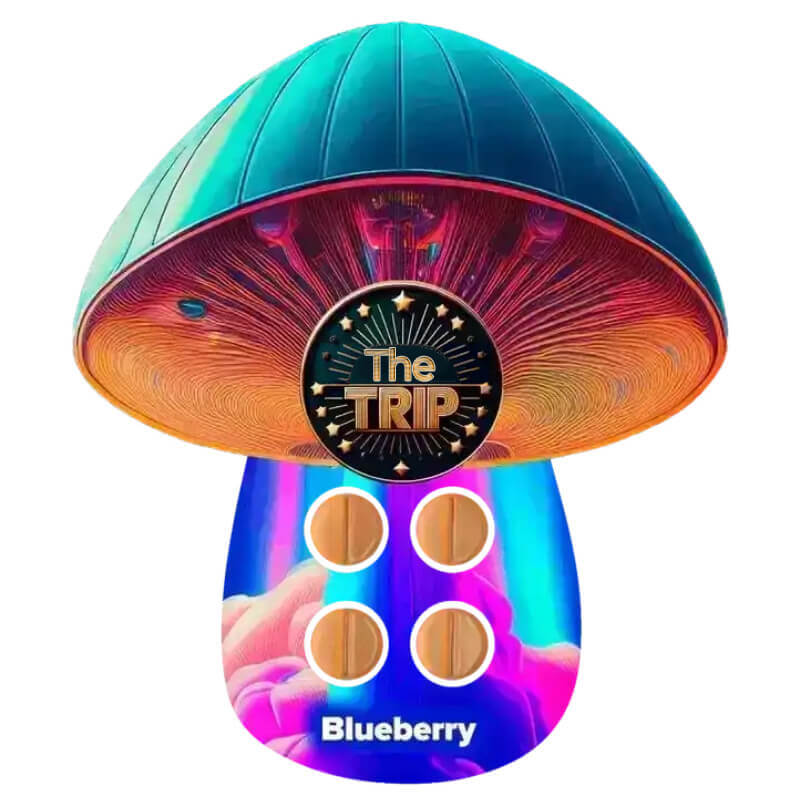 The Trip Mushroom Tabs, Blueberry flavor pouch with psychedelic design and bold berry visuals.